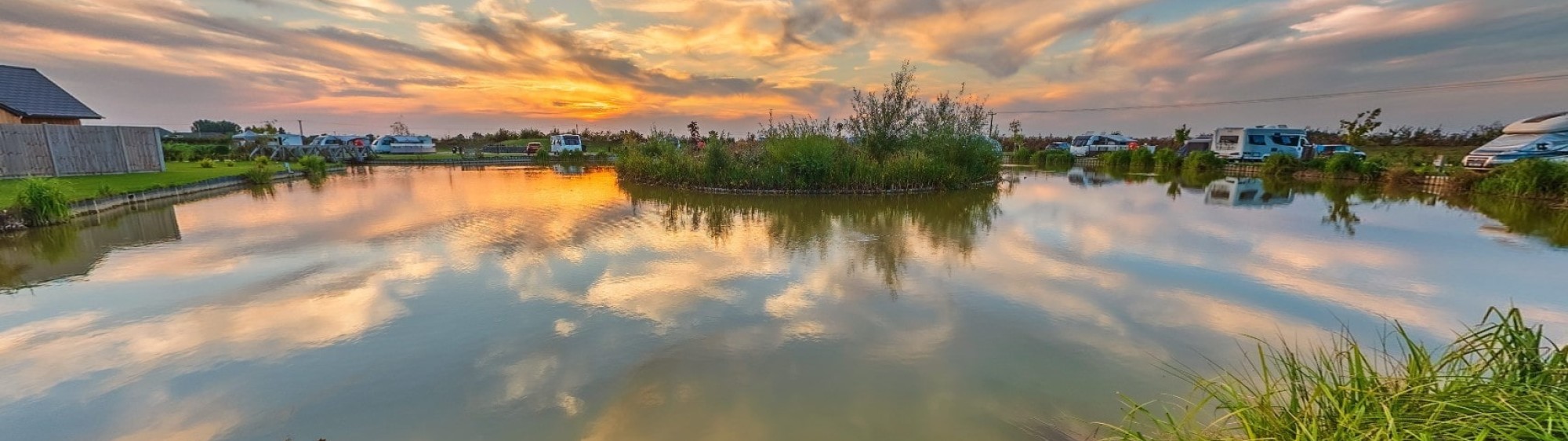 Fishing lake sunset view